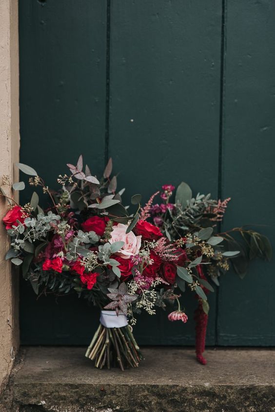 a bold wedding bouquet of blush and red roses, greenery and amaranthus is amazing for the fall or winter