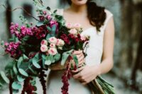 a bright wedding bouquet of blush roses, fuchsia blooms, greenery, twigs and amaranthus is amazing for the fall