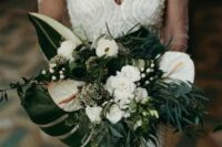 a chic bouquet with white blooms and much greenery of various textures for a bold look