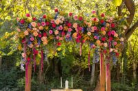 a cute, colorful wedding arch