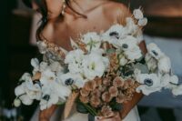 a cool wedding bouquet of white anemones, lunaria, dried grasses and allium is a lovely idea for a boho bride who loves neutrals