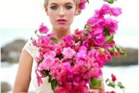 a lush and bold bougainvillea wedding bouquet with logn matching ribbon is a fantastic idea for a destination wedding