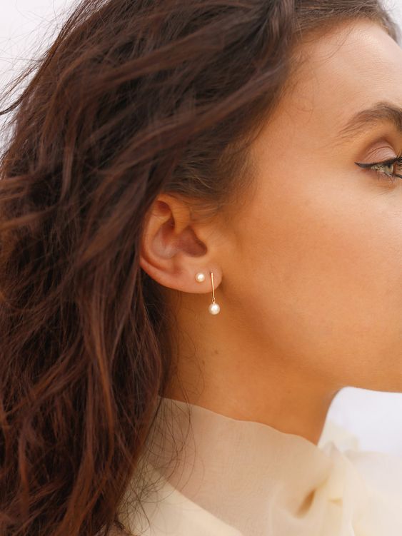 a pearl bar drop earring paired with a matching stud are a great idea for a modern or minimalist bride