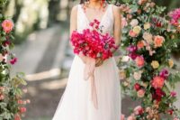 a stunning bougainvillea wedding bouquet with some blush ribbon is a catchy idea for a summer wedding