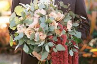 a stunning wedding bouquet of blush roses, greenery and amaranthus is amazing for a summer or fall wedding