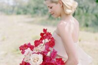 an elegant wedding bouquet of blush roses and bougainvillear is a cool idea for a summer wedding infused with color