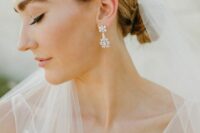 beautiful floral crystal earrings like these ones will make your bridal look sophisticated and chic