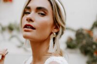 boho bridal earrings with a polished arch, a pearl and long fringe are amazing for a boho bride