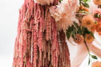 decorate your wedding arch with blush dahlias, rust mums and amaranthus to make it delicate-colored and textural-looking