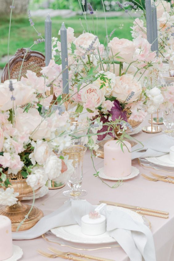 lush dimensional wedding centerpieces of blush roses, peony roses and sweet pears plus some greenery and lavender for a French chateau wedding