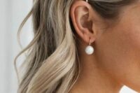 modern bridal earrings with large pearls are amazing to finish off a modern or minimalist bridal look, these are a fresh take on classics