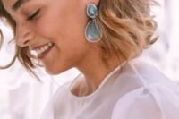 statement blue rhinestone earrings are great to add color, to echo with your eyes and make a statement