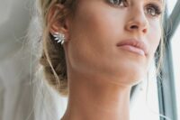 statement crystal earrings like these ones will make an accent and add a touch of glam to the look