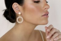 stunning drop circle earrings with large crystals are amazing for modern brides who want to make a statement
