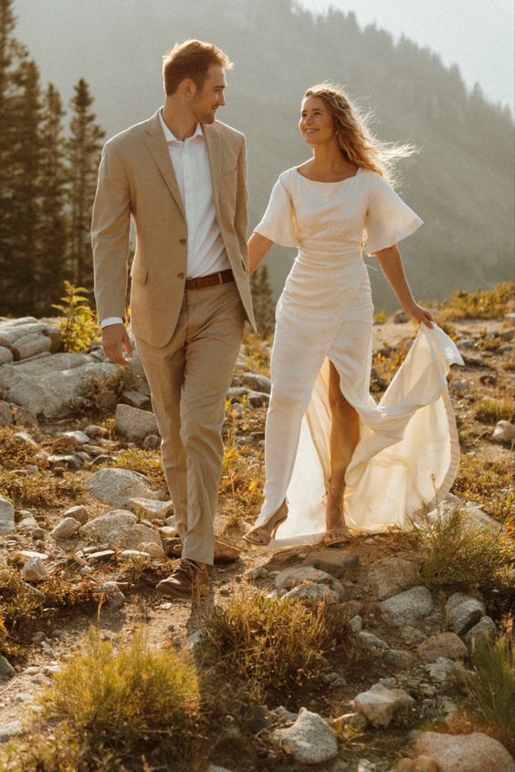 a simple and elegant groom's look with a beige pantsuit, a white shirt, brown shoes and a belt is a lovely idea for summer or fall