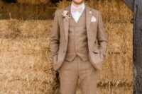 29 a light brown three-piece checked pantsuit, a white shirt, a pink bow tie and black shoes for a rustic groom’s look