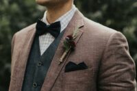 46 a boho groom’s look with a checked shirt, a grey waistcoat, a brown blazer, a black bow tie and a handkerchief