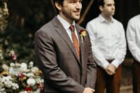 48 a catchy boho fall groom’s look with a white shirt, rust trousers, a brown blazer, a rust tie and a bold boutonniere