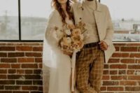 50 a creamy turtleneck, a creamy jacket, rust-colored windowpane pants, tan Chelsea boots are a great look for a boho wedding