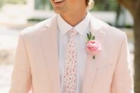 a blush pantsuit, a white shirt, a bright printed tie, a pink boutonniere are a cool combo for a spring wedding with soft touches of color