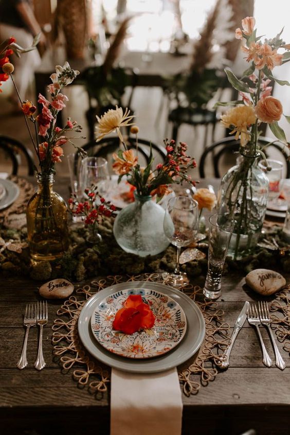 a bright cluster wedding centerpiece of mums and some wildflowers, greenery and berries is a cool idea for the fall