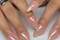 a lovely almost clear blush glazed donut manicure, with long almond-shaped nails, is a catchy and stylish idea