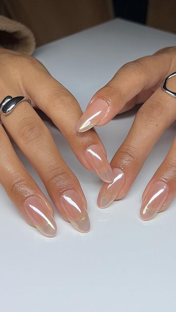 a lovely almost clear blush glazed donut manicure, with long almond-shaped nails, is a catchy and stylish idea