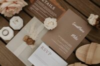 a lovely wedding invitation suite with a brown, taupe, white card and a vellum envelope is cool