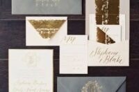 a soft wedding invitation suite in grey, gold and white, with gold glitter will be a great idea for a modern wedding