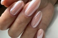 classy almond-shaped chrome blush nails are a beautiful solution for any bride, they look very up-to-date