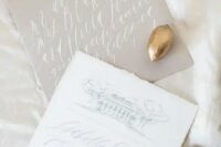 grey and white wedding invites with calligraphy remind of snowy months with neutral colors