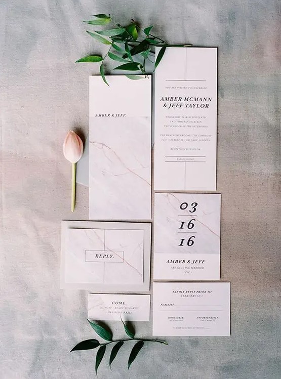laconic marble wedding invites with black letters and numbers for a simple modern wedding