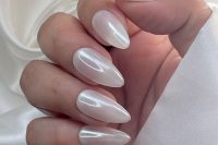 milky chrome long almond nails are the newest bridal perfection, they look bold and chic