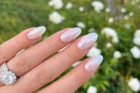 milky glazed donut almond-shaped nails are great for any bride, they look lively and shiny and make your look complete