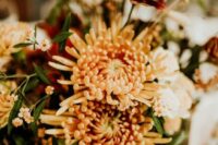 rust-colored chrysanthemums will add color to your fall centerpiece and will make it feel like fall