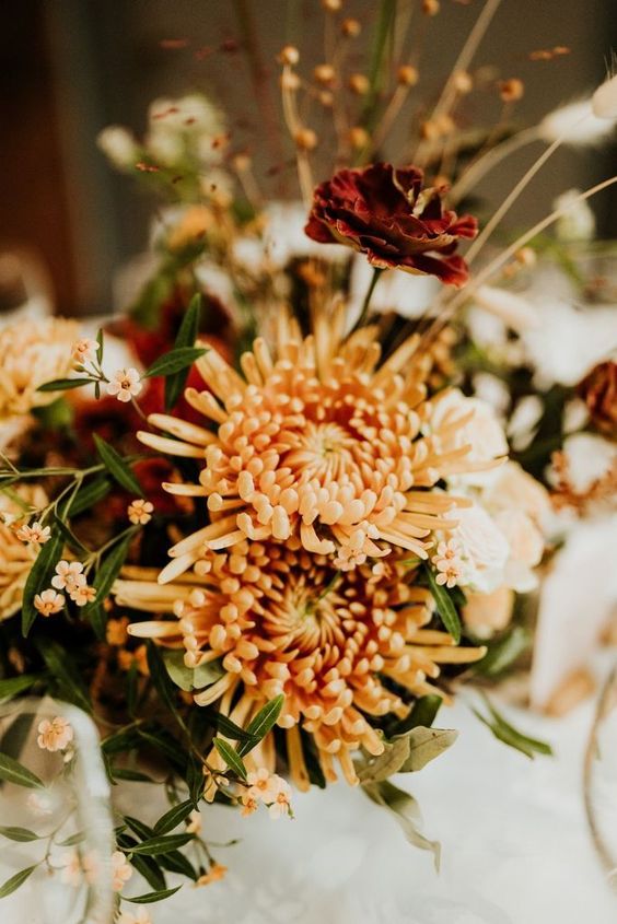 rust-colored chrysanthemums will add color to your fall centerpiece and will make it feel like fall