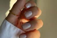 shimmery glazed pearl short nails are amazing for a slight summertime vibe, they look a bit more shiny and catchy than regular ones