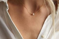 a super delicate and beautiful gold necklace with a single pearl is a dreamy and beautiful idea to wear any time and with any outfit