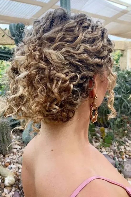 a catchy curly updo will fit medium and long hair, leave some curls down to frame the face