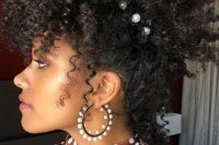 19 a catchy curly updo with pearl hair pins and some locks down to frame the face is a super cool idea