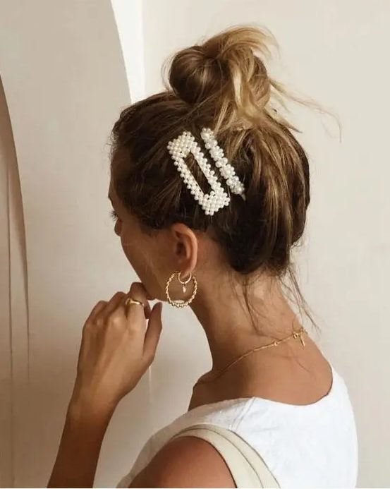 faux pearl hair clips like these ones combine two trends in one - pearls and hair clips