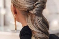 40 a beautiful twisted and wavy ow ponytail with a volume on top is an amazing and stylish bridesmaid hairstyle