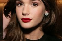 a classic red lip makeup with blush and a red lip, with a bit of highlighter and a touch of blush for the wedding