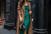 a stylish winter guest look with a green midi dress, nude shoes, a brown midi coat and a black bag