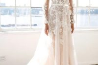04 a deep V-neckline and long sleeves ivory wedding dress with floral appliques