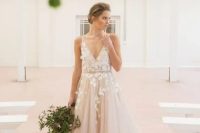 06 blush tulle wedding dress with white floral appliques on the bodice and partly on the skirt