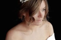 17 a sophisticated floral bridal tiara will accent your bridal look in the best way possible