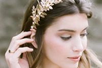 24 a gold leaf bridal tiara is a pretty statement-like headpiece that can add a glam feel to the look