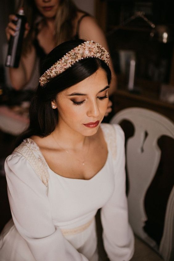 a refined gold and white floral tiara or headband like this one will give you really a royal look