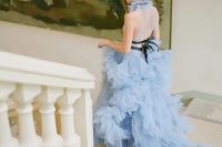 31 a fabulous blue A-line wedding dress with a ruffle collar and a ruffle tier skirt with a train plus black sashes